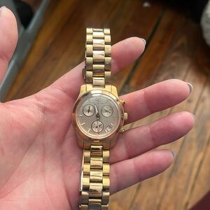 Michael Kors rose gold watch.